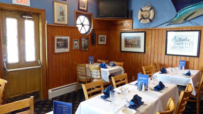 Downstairs dining room with 3 set tables