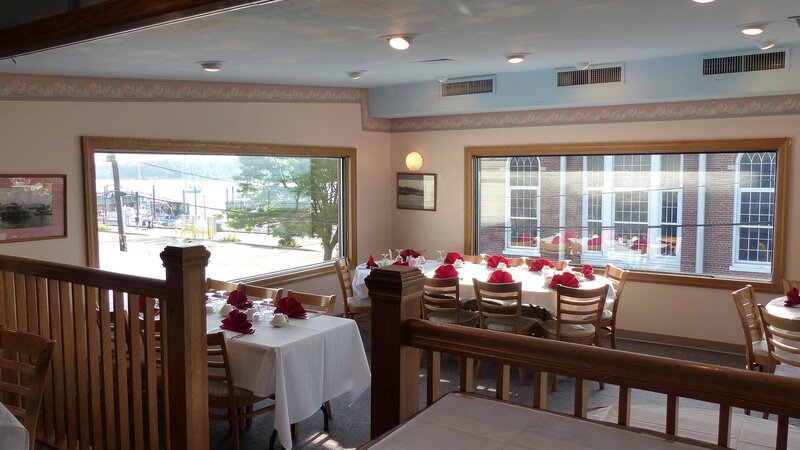 Upstairs dining room with window facing street