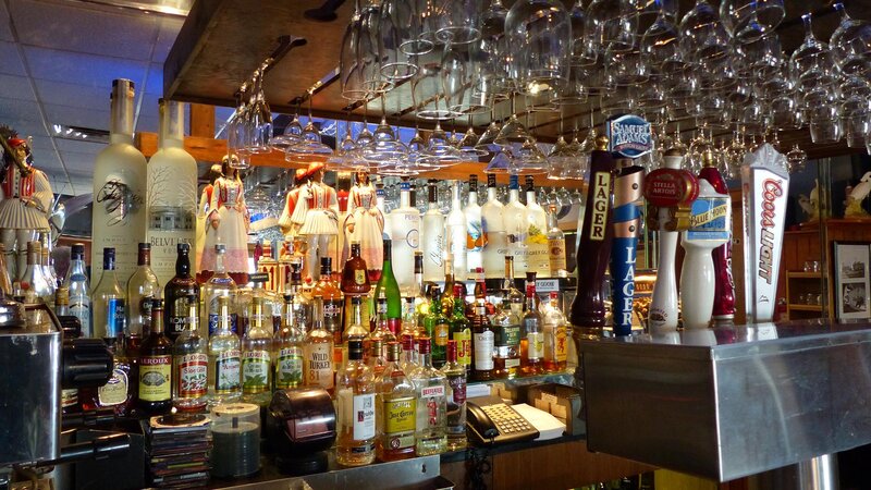 Bar area with view of liquor bottles and beer taps